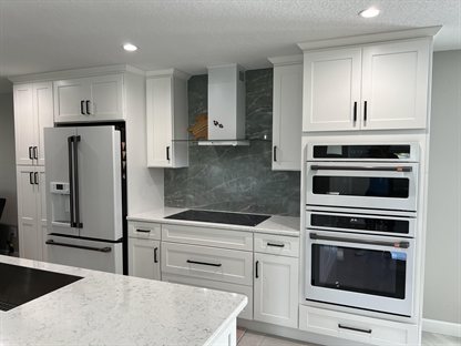 white quartz kitchen countertops with green quartzite backsplash melbourne fl