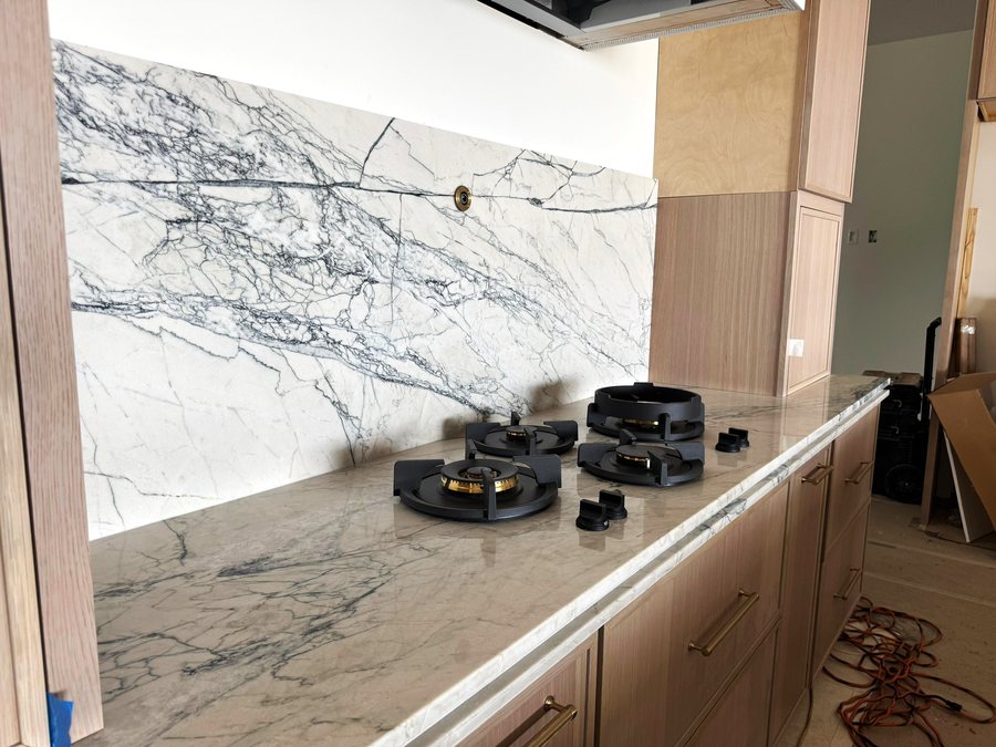 custom full height marble backsplash melbourne fl