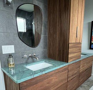 green vanity countertop with walnut cabinets melbourne fl